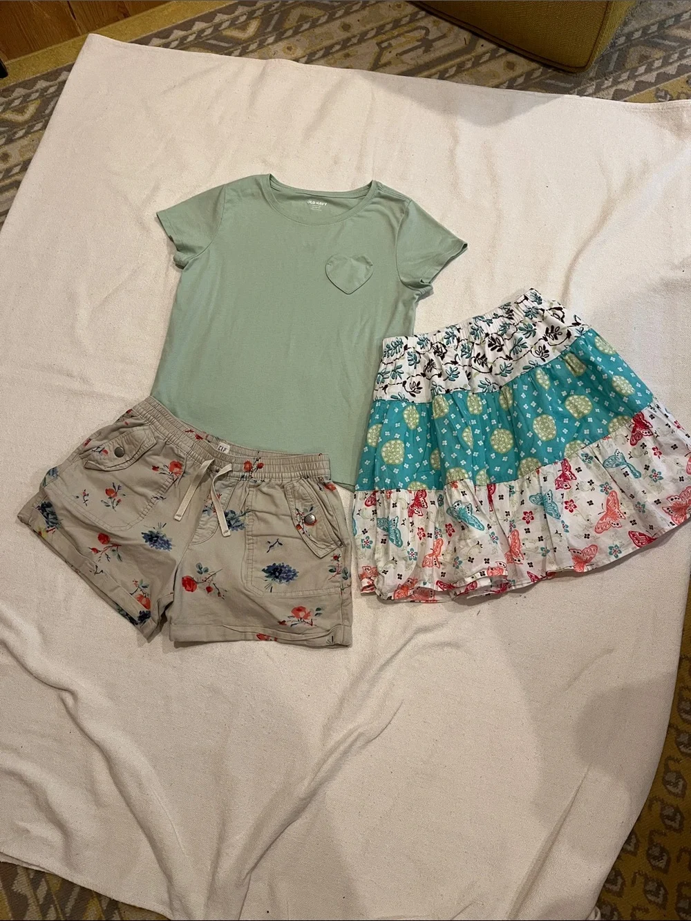This is a cute combination of 14-16 and large little girls summer wear.